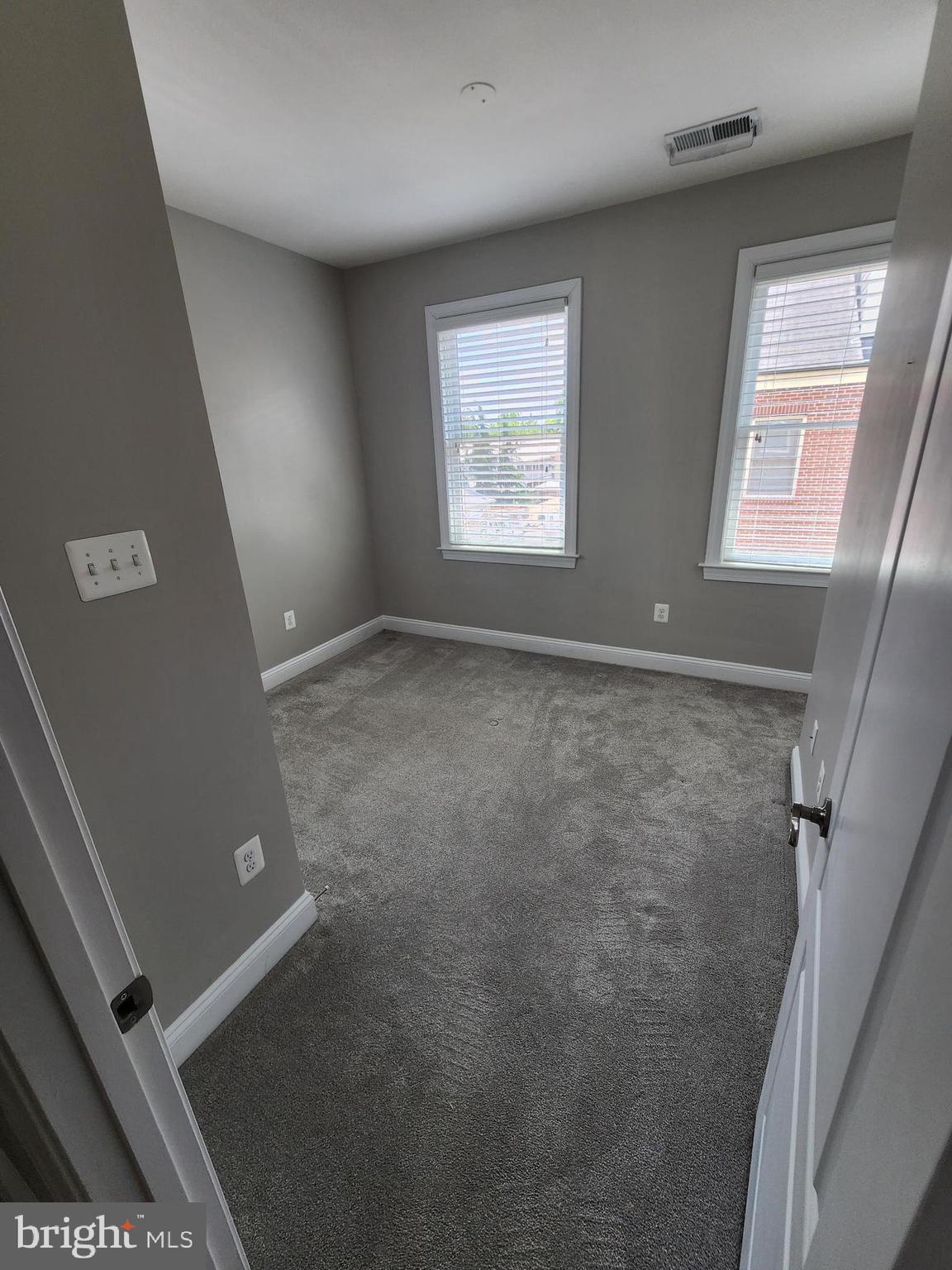 2 Maxwell Square Frederick, MD 21701 - Photo 10 of 16 an empty room with windows
