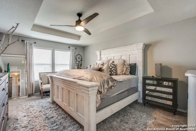 a bed room with a bed and a window