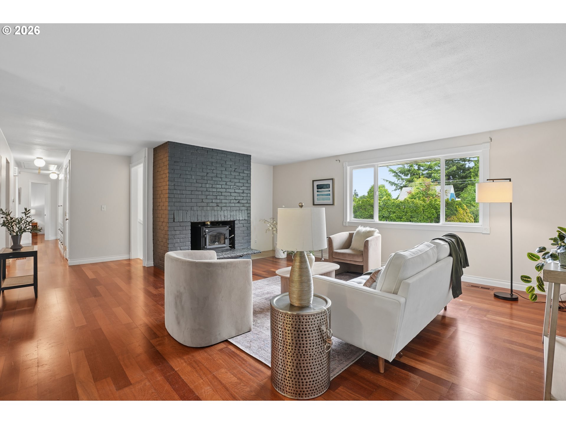 992 South South End Road Oregon City, OR 97045 - Photo 6 of 38 a living room with furniture and a fireplace