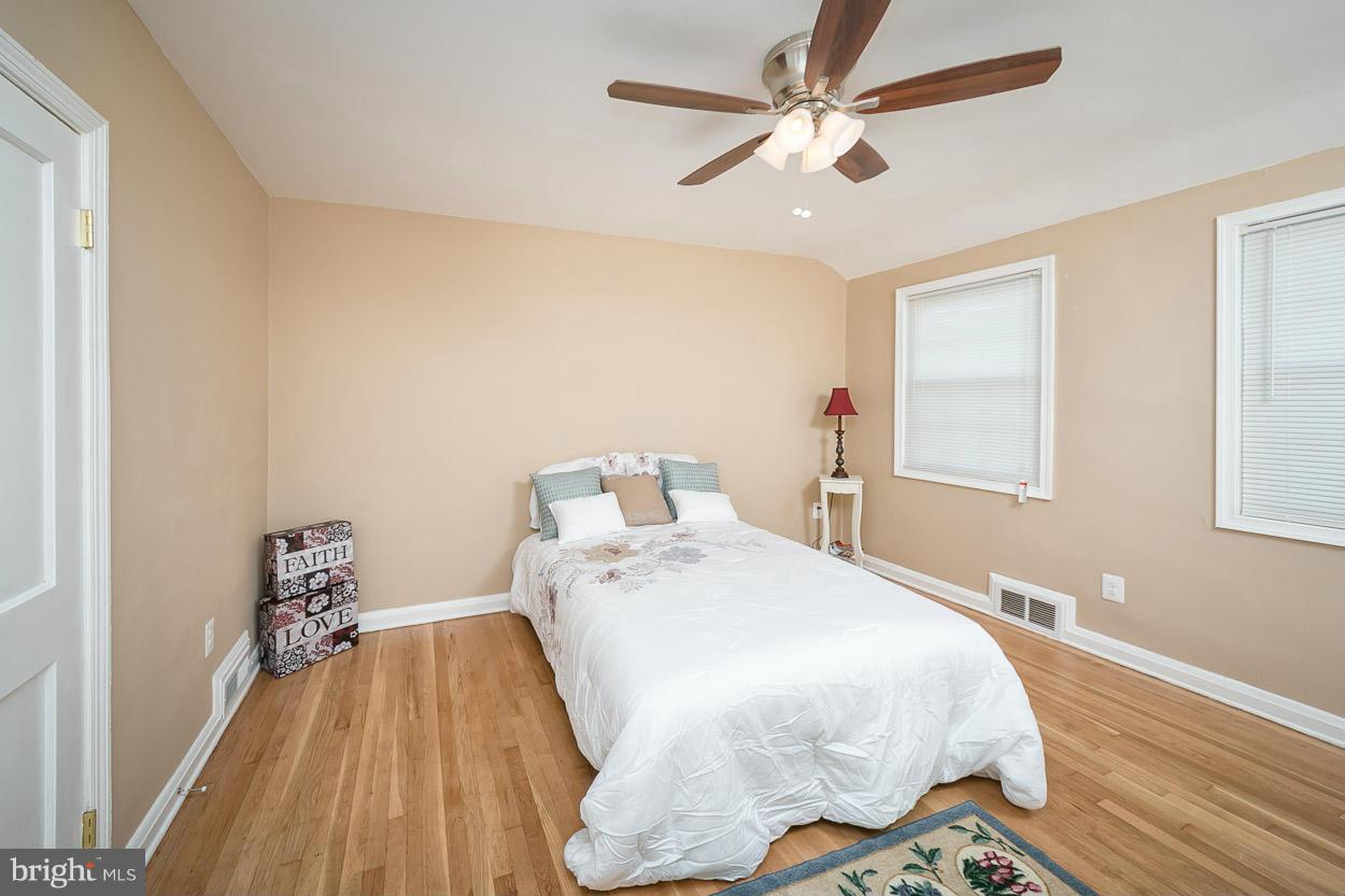 1347 Pentridge Road Baltimore, MD 21239 - Photo 14 of 30 a bed room with a bed and a window