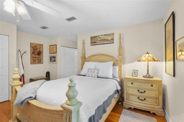 a bedroom with a bed and a dresser