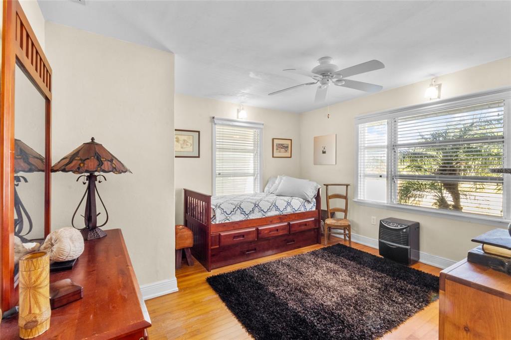 420 Pensacola Road Venice, FL 34285 - Photo 22 of 40 a living room with furniture a rug and a window