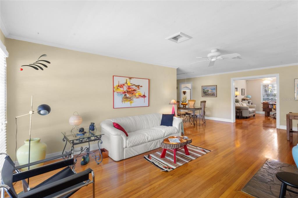 420 Pensacola Road Venice, FL 34285 - Photo 3 of 40 a living room with furniture and wooden floor