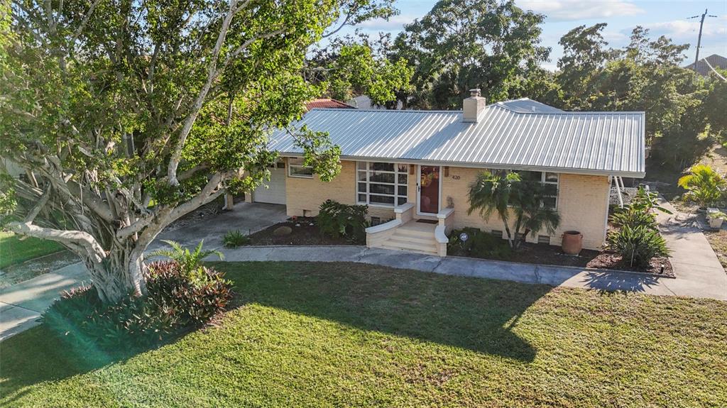 420 Pensacola Road Venice, FL 34285 - Photo 39 of 40 a front view of a house with garden