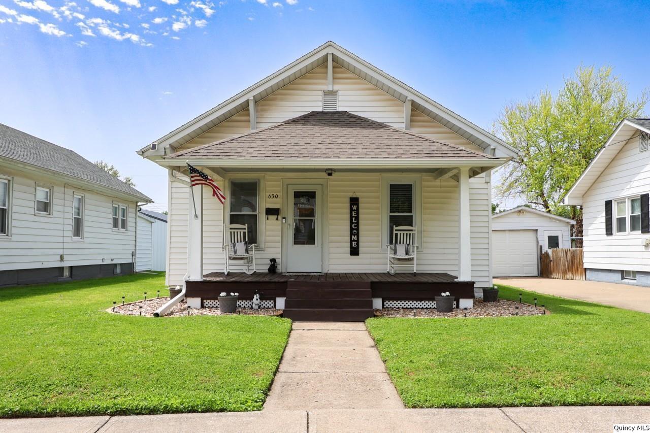 630 South 19th Street Quincy, IL 62301 - Photo 1 of 17 a front view of house with yard