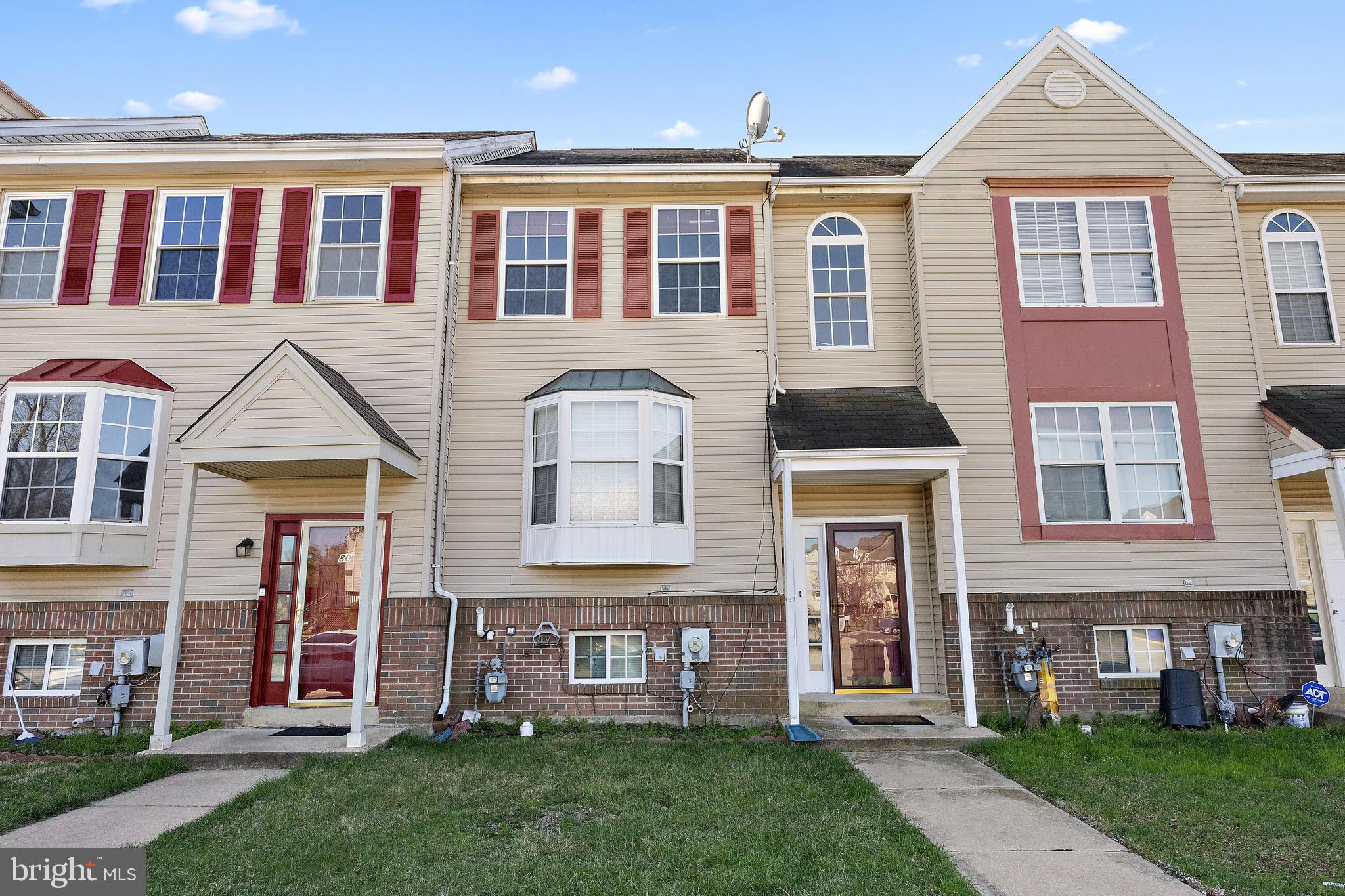78 3 Rivers Drive Newark, DE 19702 - Photo 1 of 27 front view of a brick house with a yard