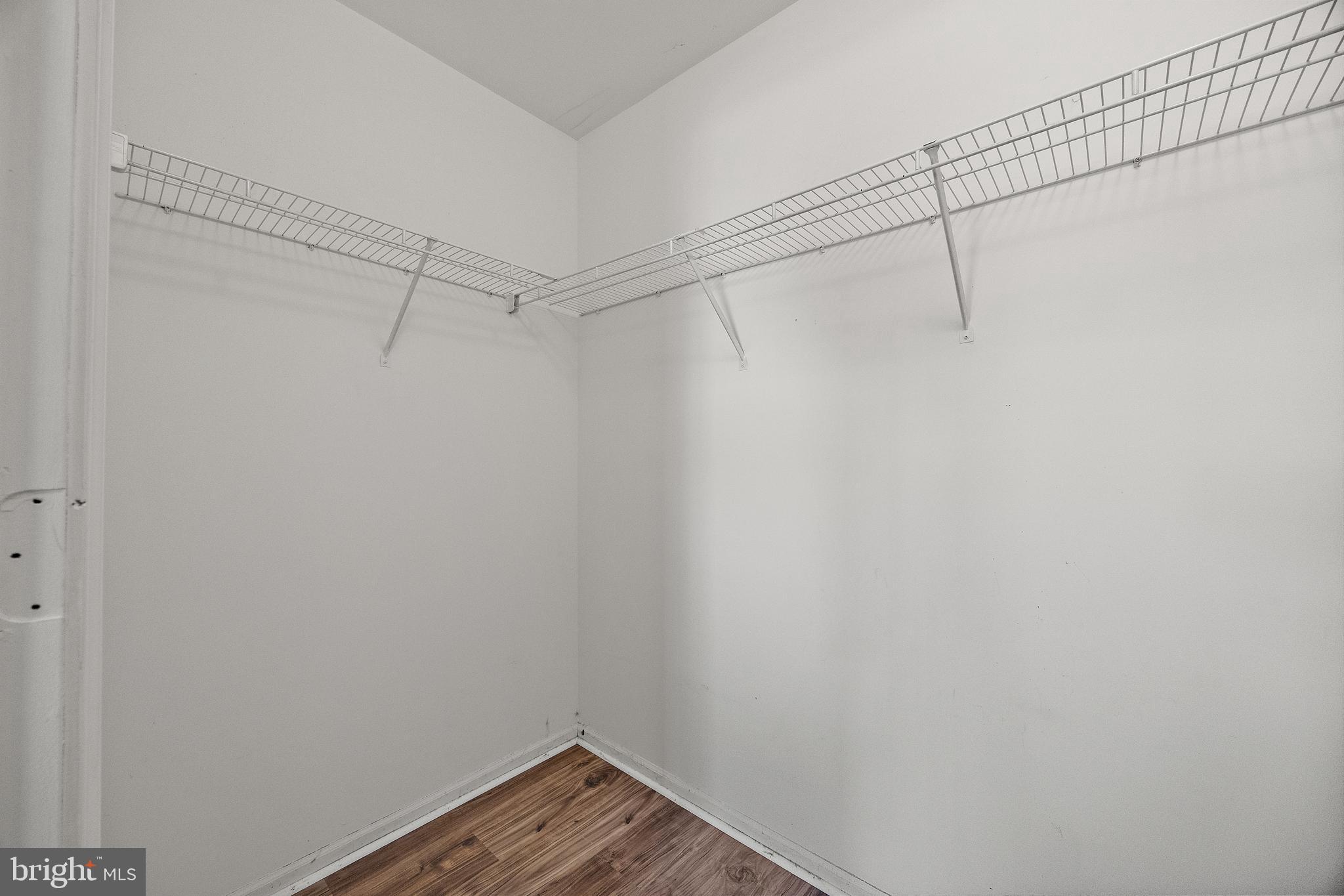 78 3 Rivers Drive Newark, DE 19702 - Photo 12 of 27 a view of a room with racks on the wall