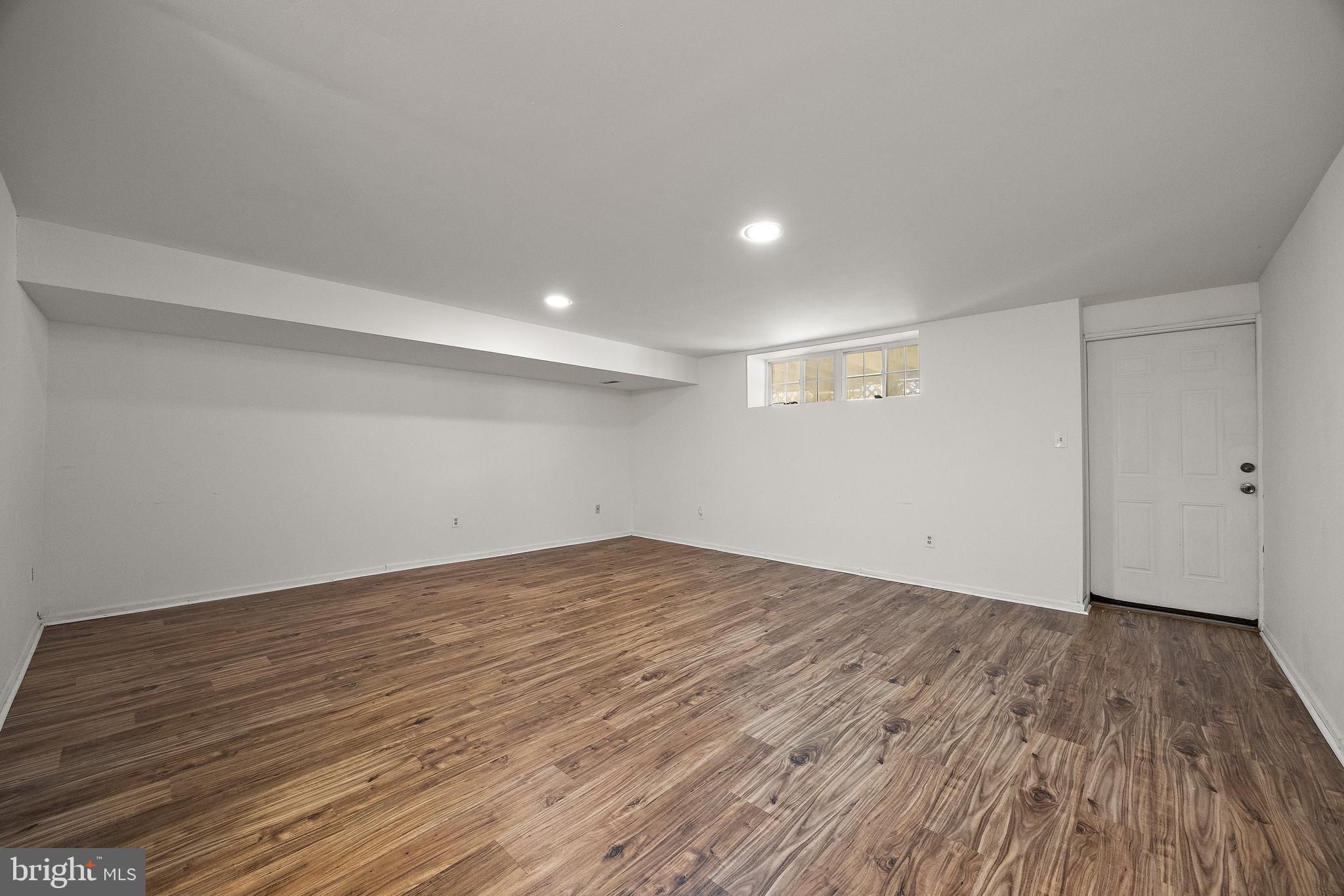 78 3 Rivers Drive Newark, DE 19702 - Photo 19 of 27 a view of empty room with wooden floor
