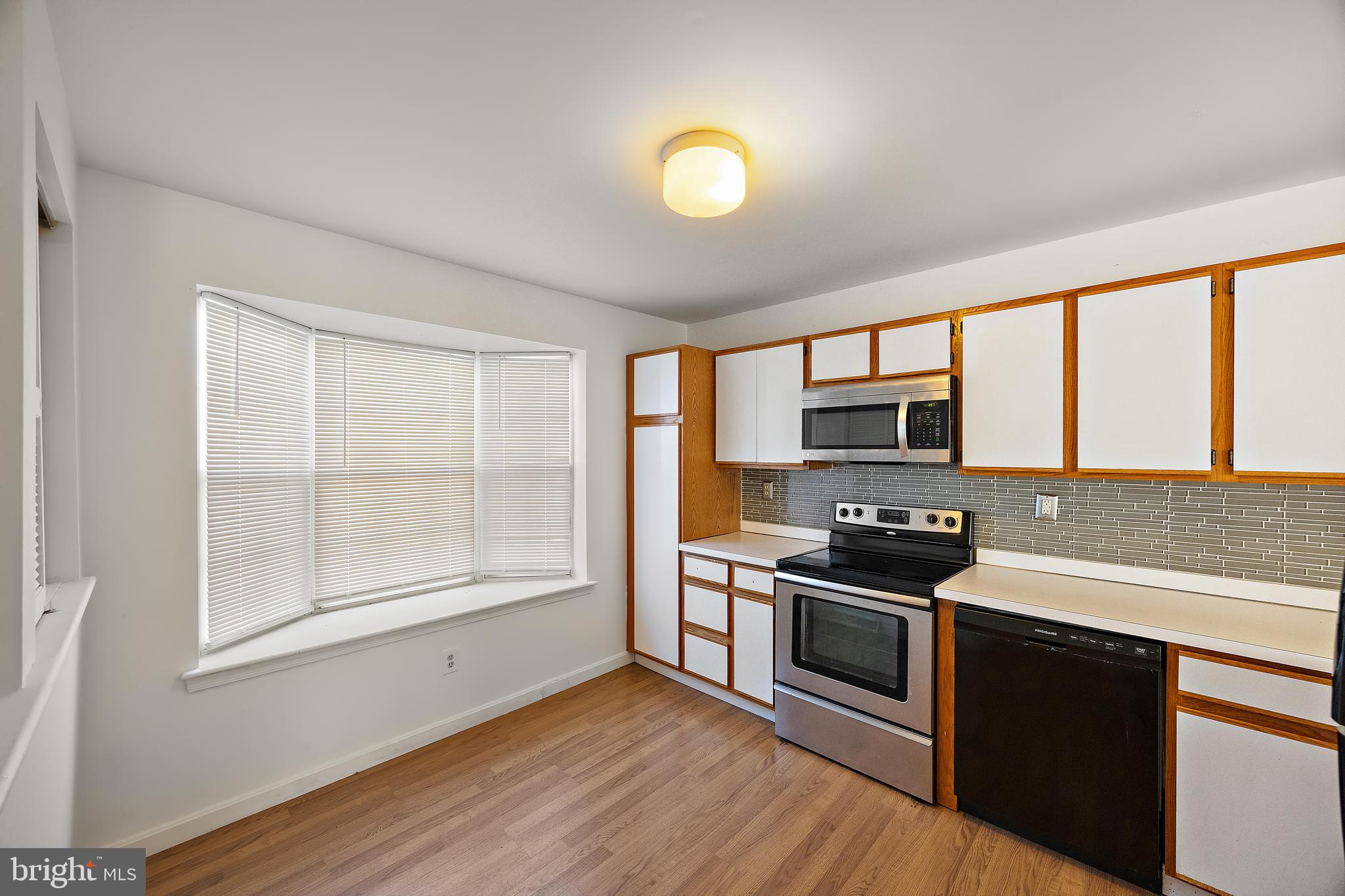 78 3 Rivers Drive Newark, DE 19702 - Photo 2 of 27 a kitchen with stainless steel appliances granite countertop a stove and a sink
