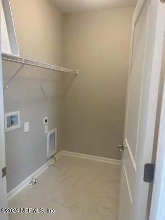 a bathroom with a sink toilet and vanity