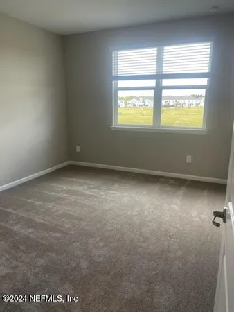 an empty room with window