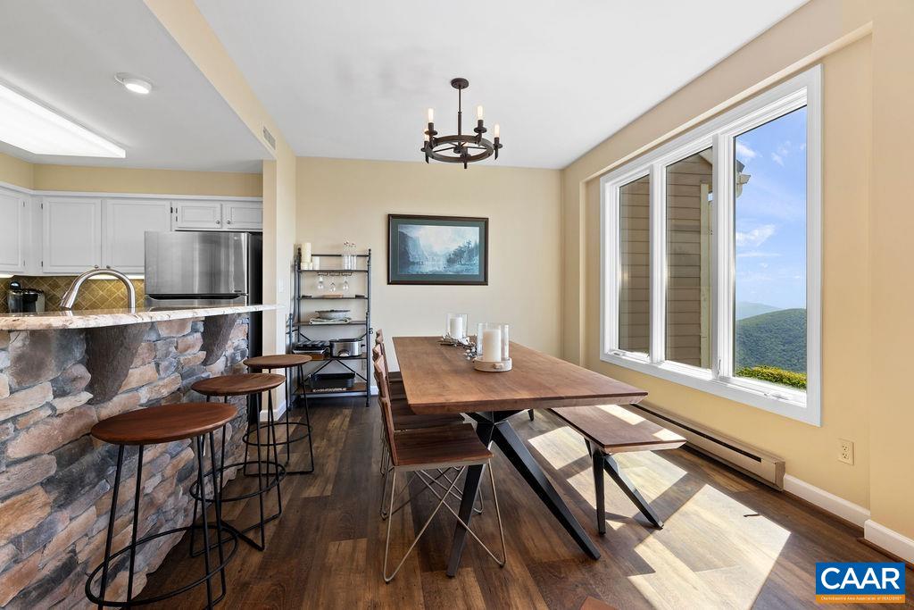 1807 High Ridge Roseland, VA 22967 - Photo 8 of 54 a view of a dining room with furniture window and wooden floor