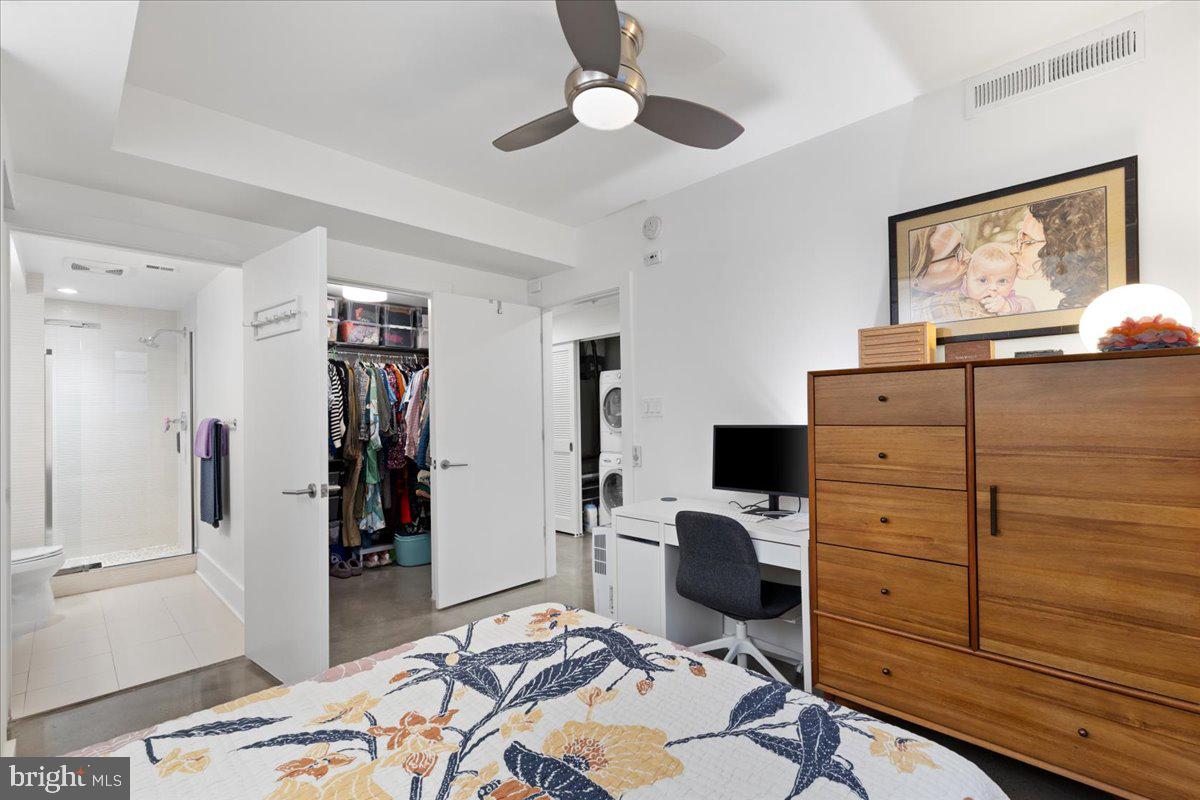 2818 Connecticut Avenue Northwest, Unit 104 Washington, DC 20008 - Photo 13 of 27 a bedroom with a bed and furniture