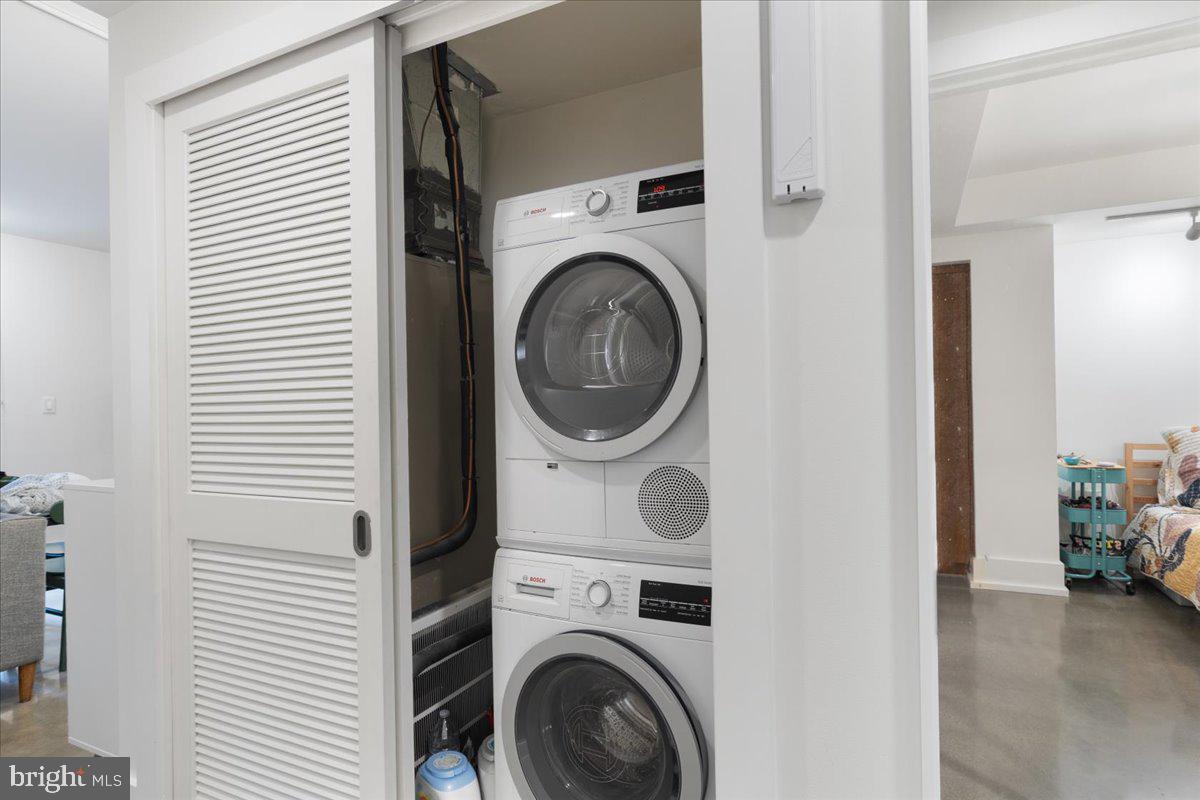 2818 Connecticut Avenue Northwest, Unit 104 Washington, DC 20008 - Photo 20 of 27 a utility room with dryer and washer