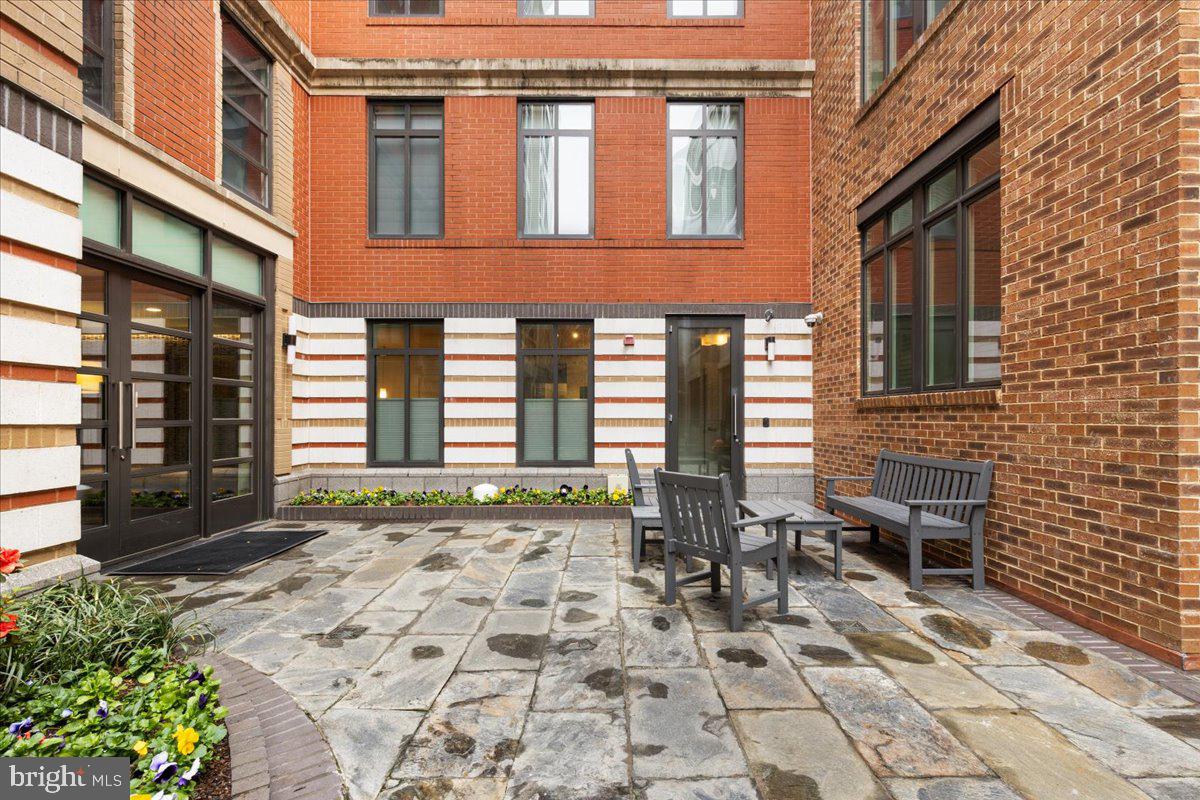 2818 Connecticut Avenue Northwest, Unit 104 Washington, DC 20008 - Photo 22 of 27 a view of a brick building with many windows