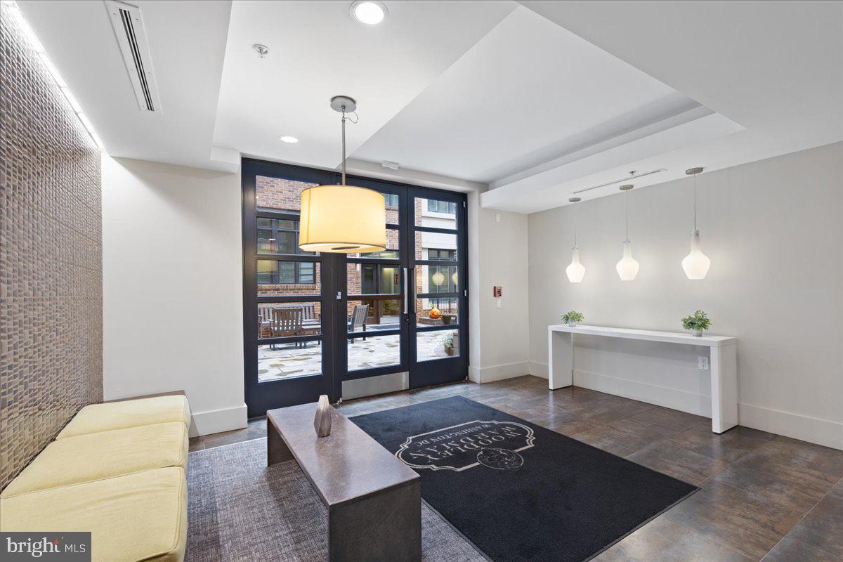 2818 Connecticut Avenue Northwest, Unit 104 Washington, DC 20008 - Photo 25 of 27 a view of workspace with furniture and window