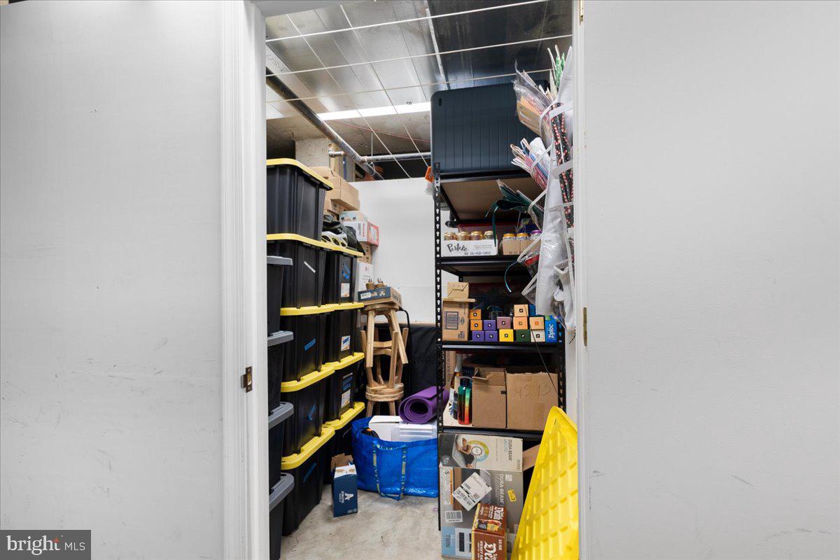 2818 Connecticut Avenue Northwest, Unit 104 Washington, DC 20008 - Photo 26 of 27 a view of walk in closet with clothes and shoes