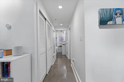 a bedroom with a bed and a table