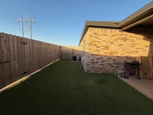 a view of outdoor space and barbecue grill