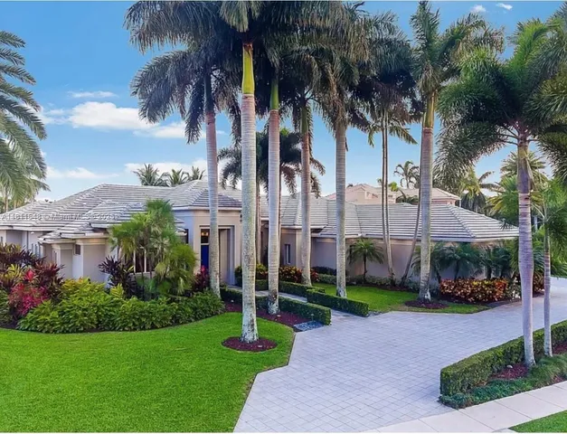 a city street lined with buildings and trees