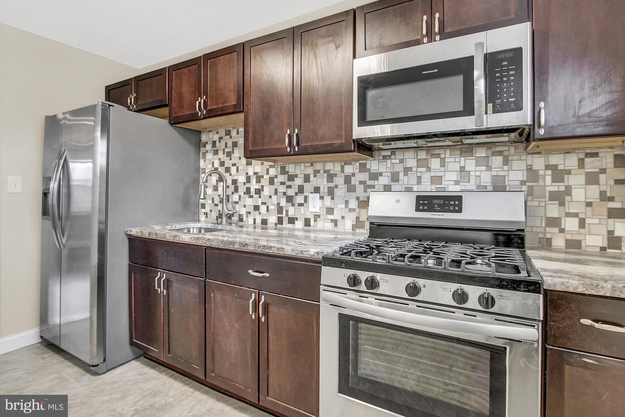 4213 Labyrinth Road Baltimore, MD 21215 - Photo 1 of 19 All New Kitchen with Stainless Appliances