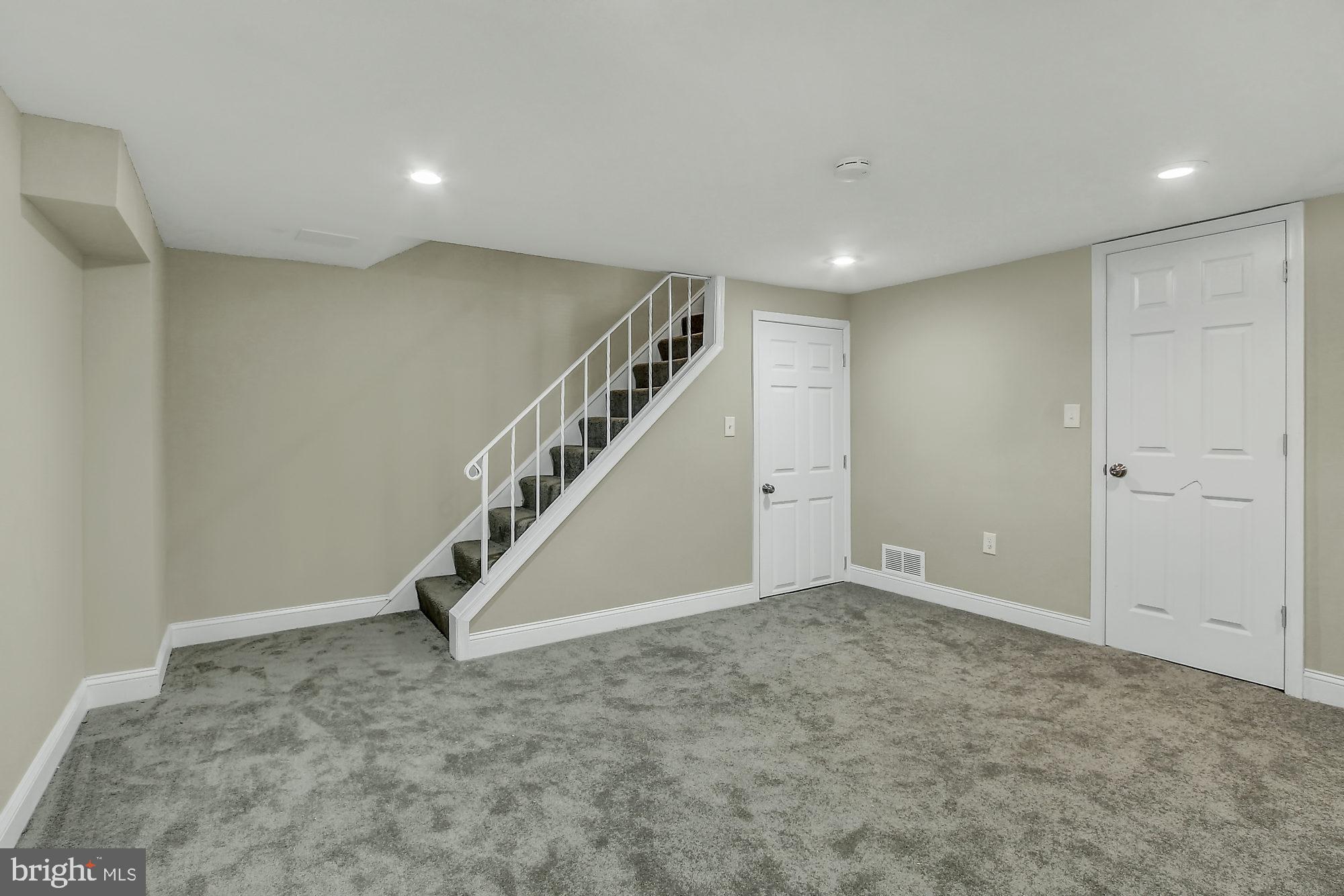 4213 Labyrinth Road Baltimore, MD 21215 - Photo 13 of 19 Basement Family Room with Laundry Room