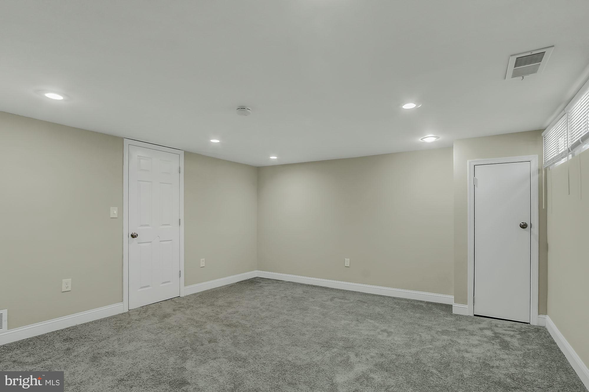 4213 Labyrinth Road Baltimore, MD 21215 - Photo 14 of 19 Basement Family Room