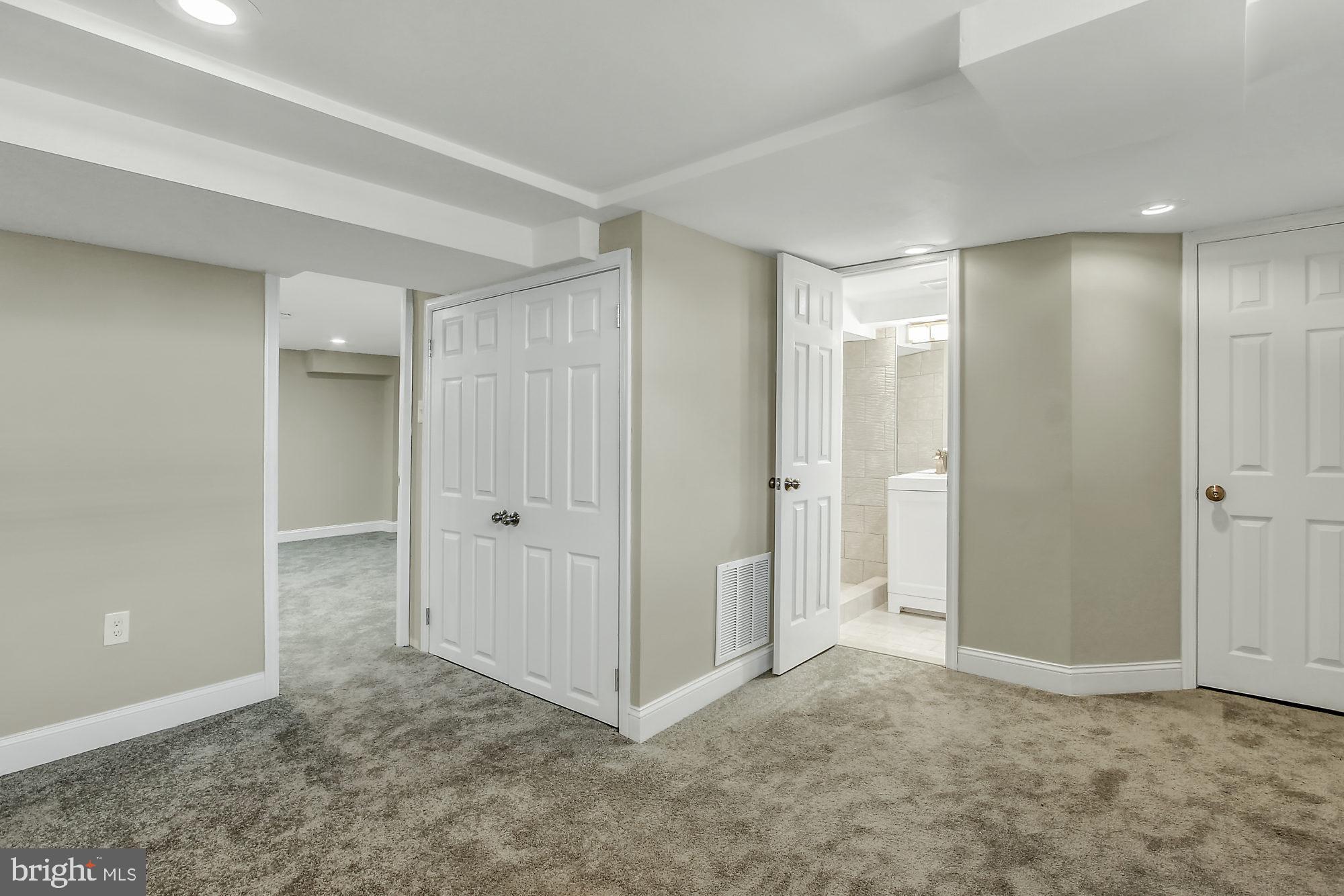 4213 Labyrinth Road Baltimore, MD 21215 - Photo 15 of 19 Basement Bedroom with Full Bath