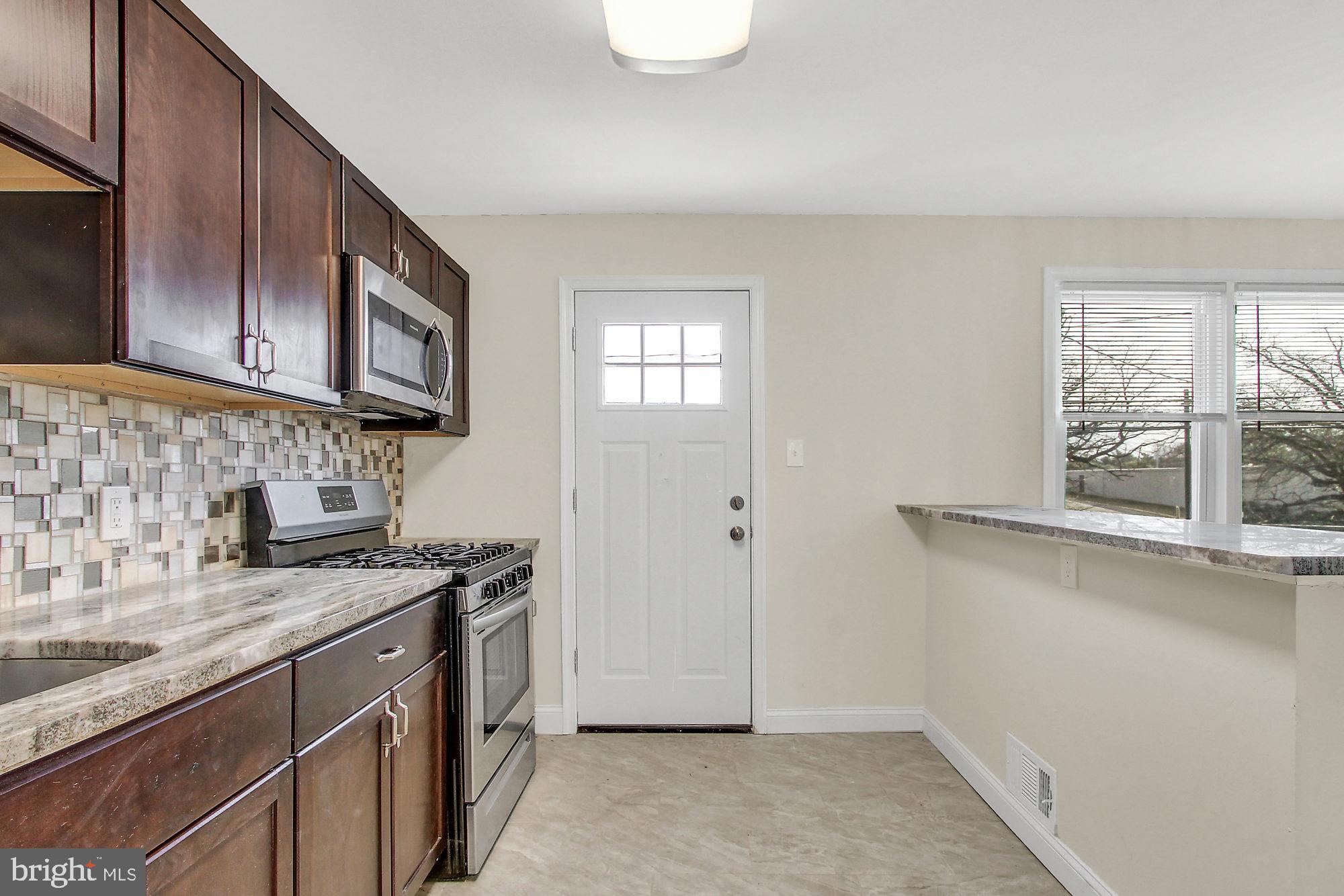 4213 Labyrinth Road Baltimore, MD 21215 - Photo 3 of 19 Spacious Kitchen with Pantry
