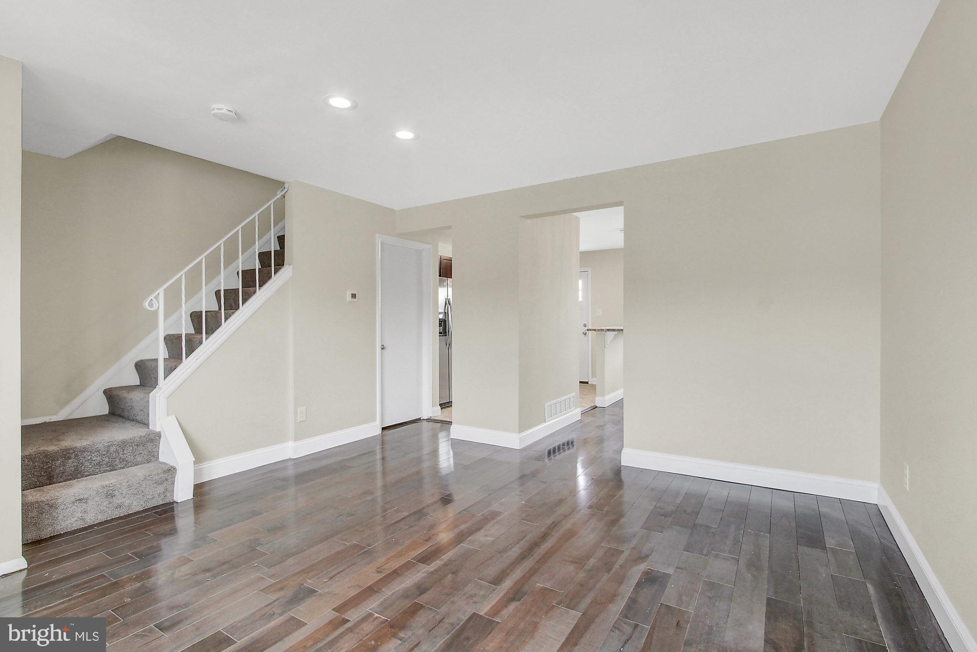 4213 Labyrinth Road Baltimore, MD 21215 - Photo 6 of 19 All New Solid Hardwood Floor on entire 1st floor