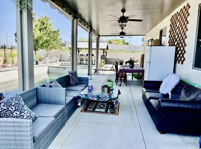 a building outdoor space with patio furniture