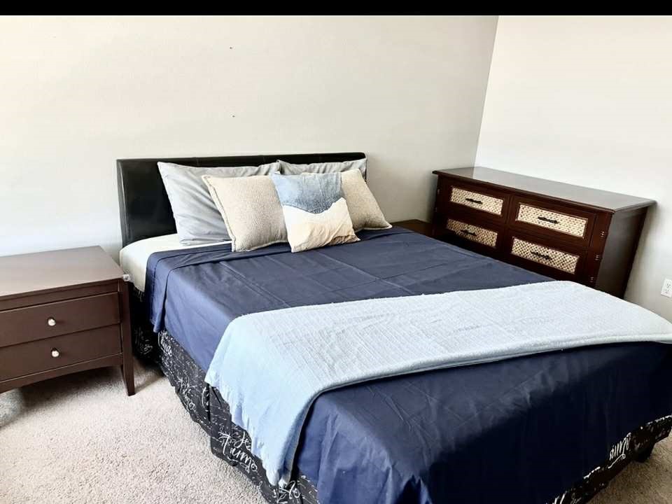 31509 Tuberose Road Murrieta, CA 92563 - Photo 22 of 41 a bedroom with a bed and a night stand