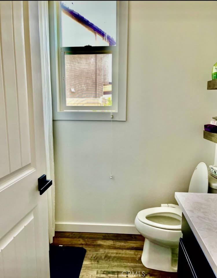 31509 Tuberose Road Murrieta, CA 92563 - Photo 25 of 41 a bathroom with a toilet and a window