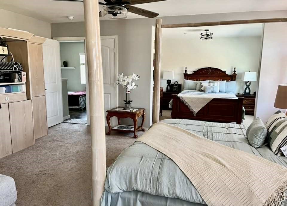 31509 Tuberose Road Murrieta, CA 92563 - Photo 30 of 41 a bedroom with a bed and a mirror