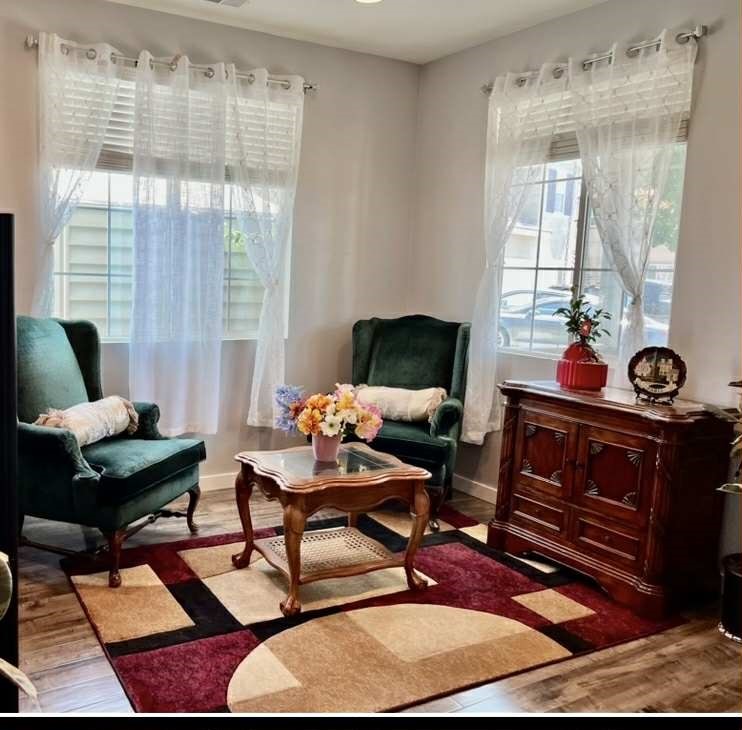 31509 Tuberose Road Murrieta, CA 92563 - Photo 4 of 41 a living room with furniture and a floor to ceiling window
