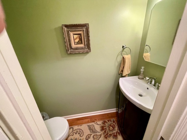 1154 Inverrary Lane, Unit 1154 Deerfield, IL 60015 - Photo 9 of 19 a bathroom with a sink and a mirror