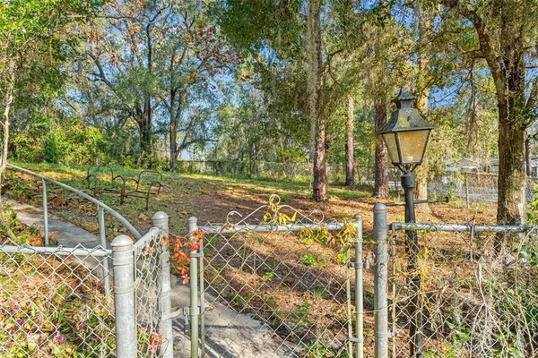 a kitchen with a refrigerator and a stove