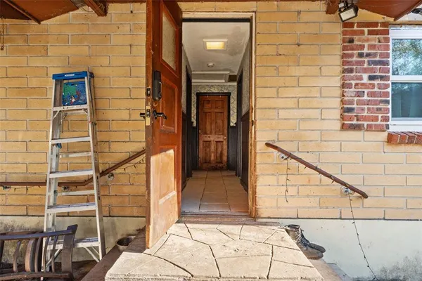 a bathroom with a sink vanity mirror and toilet