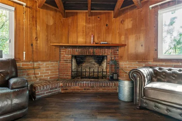 a kitchen with stainless steel appliances granite countertop a refrigerator and a stove