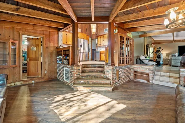 a kitchen with a sink cabinets and window