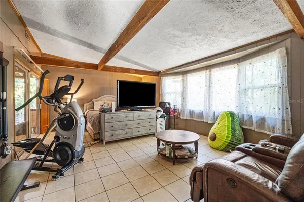 a view of a living room and a window