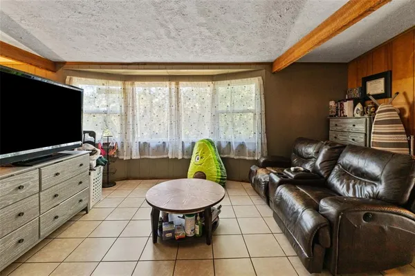 a workspace with furniture and a window