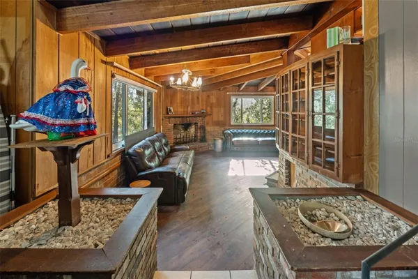 a view of a storage room with a table and chairs