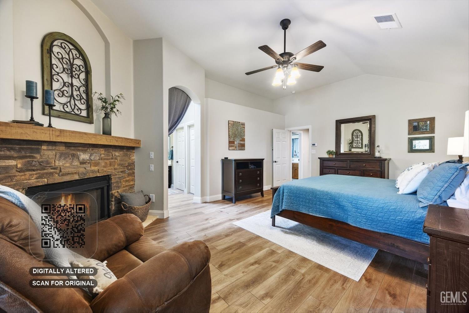 Undisclosed Address Bakersfield, CA 93314 - Photo 26 of 58 a living room with furniture and a fireplace