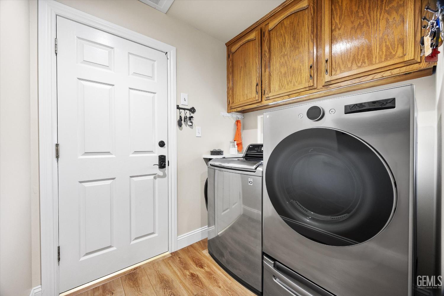 Undisclosed Address Bakersfield, CA 93314 - Photo 41 of 58 a utility room with dryer and washer