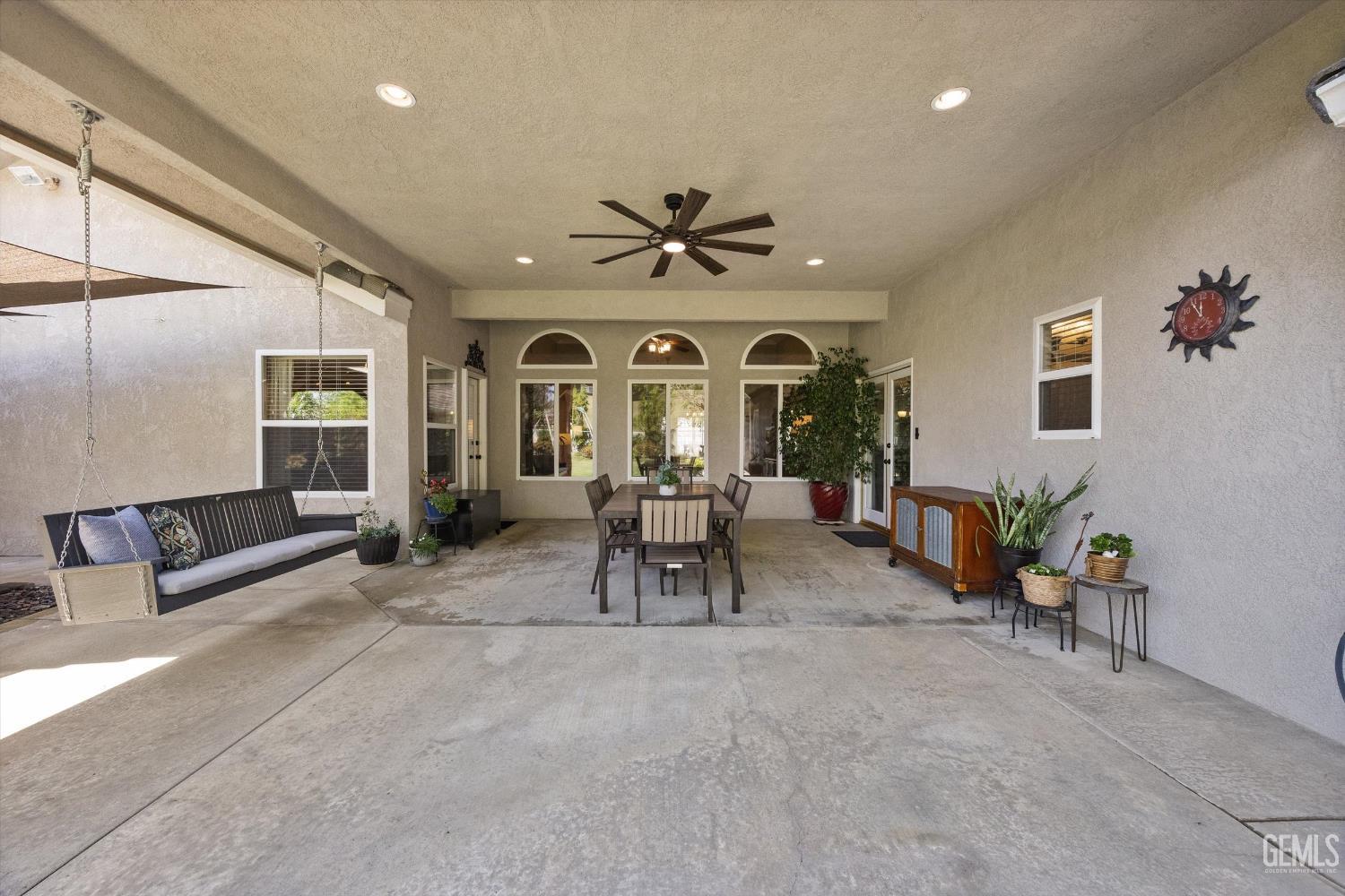 Undisclosed Address Bakersfield, CA 93314 - Photo 42 of 58 a living room with furniture and a chandelier