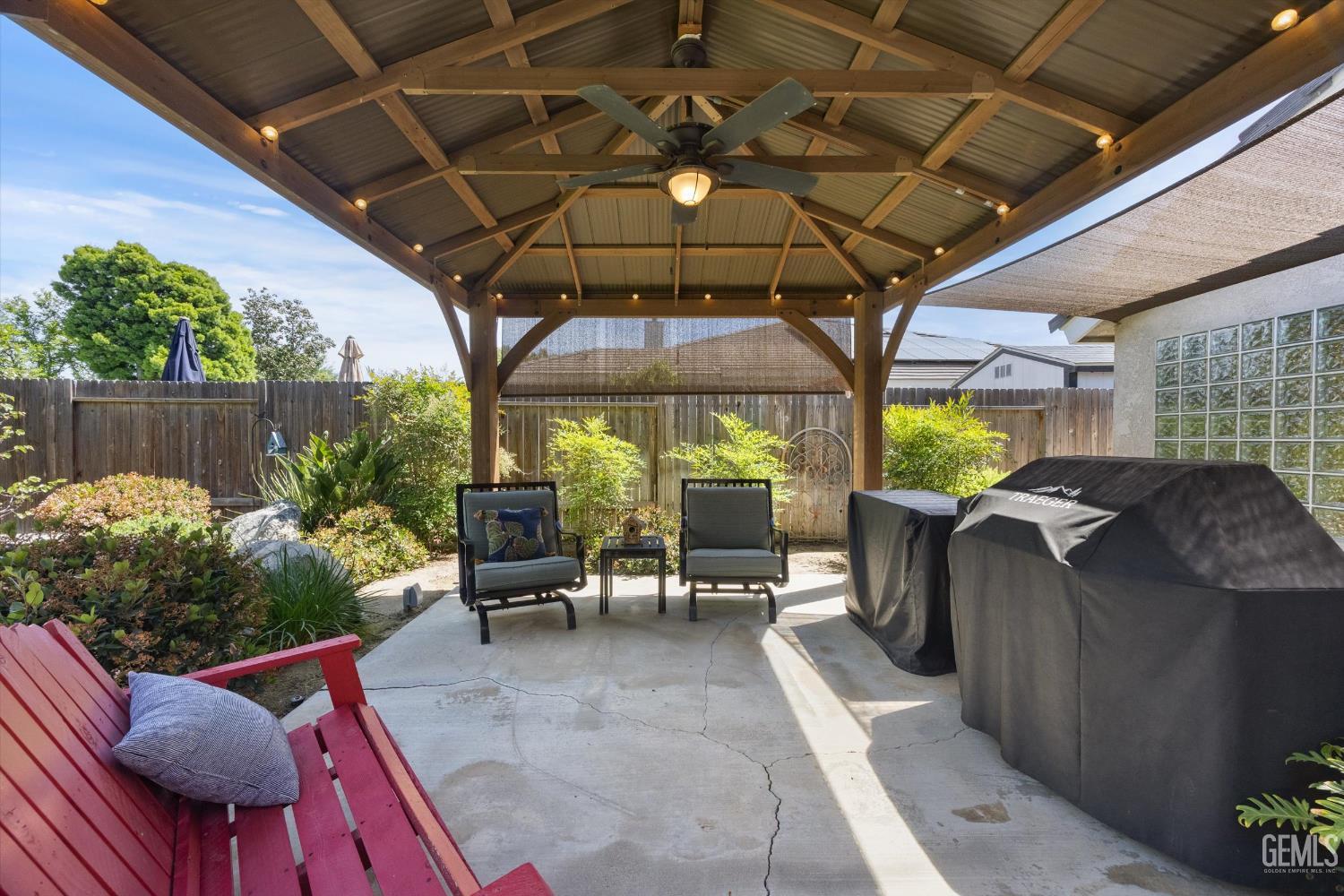 Undisclosed Address Bakersfield, CA 93314 - Photo 45 of 58 a patio with yard table and chairs
