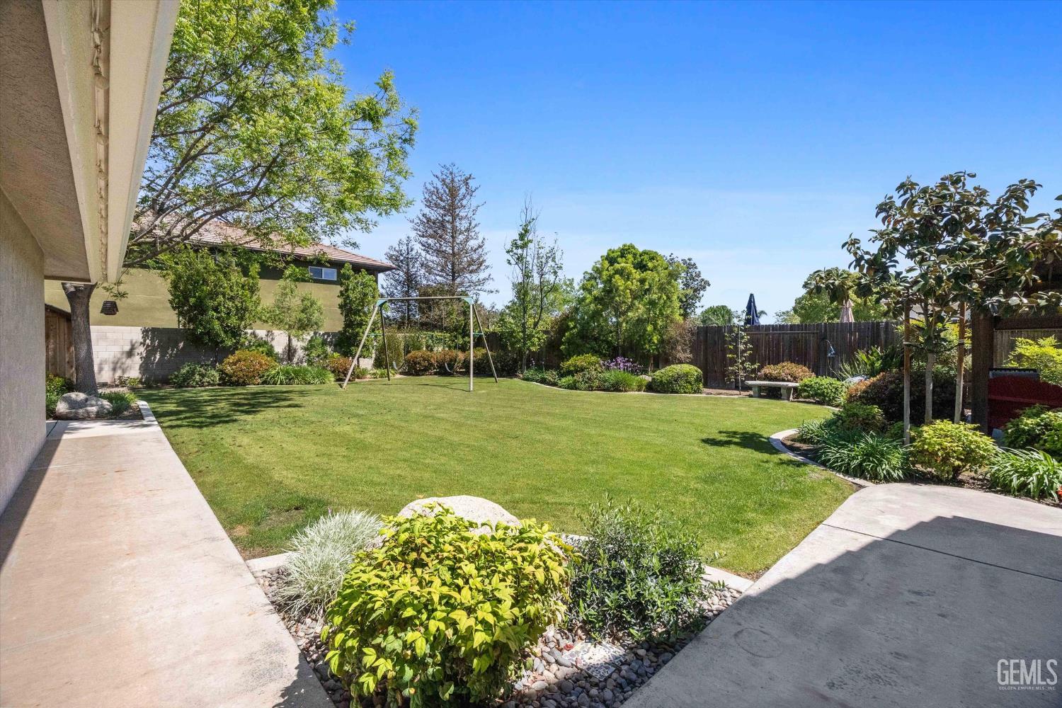 Undisclosed Address Bakersfield, CA 93314 - Photo 47 of 58 a view of a park with plants and trees