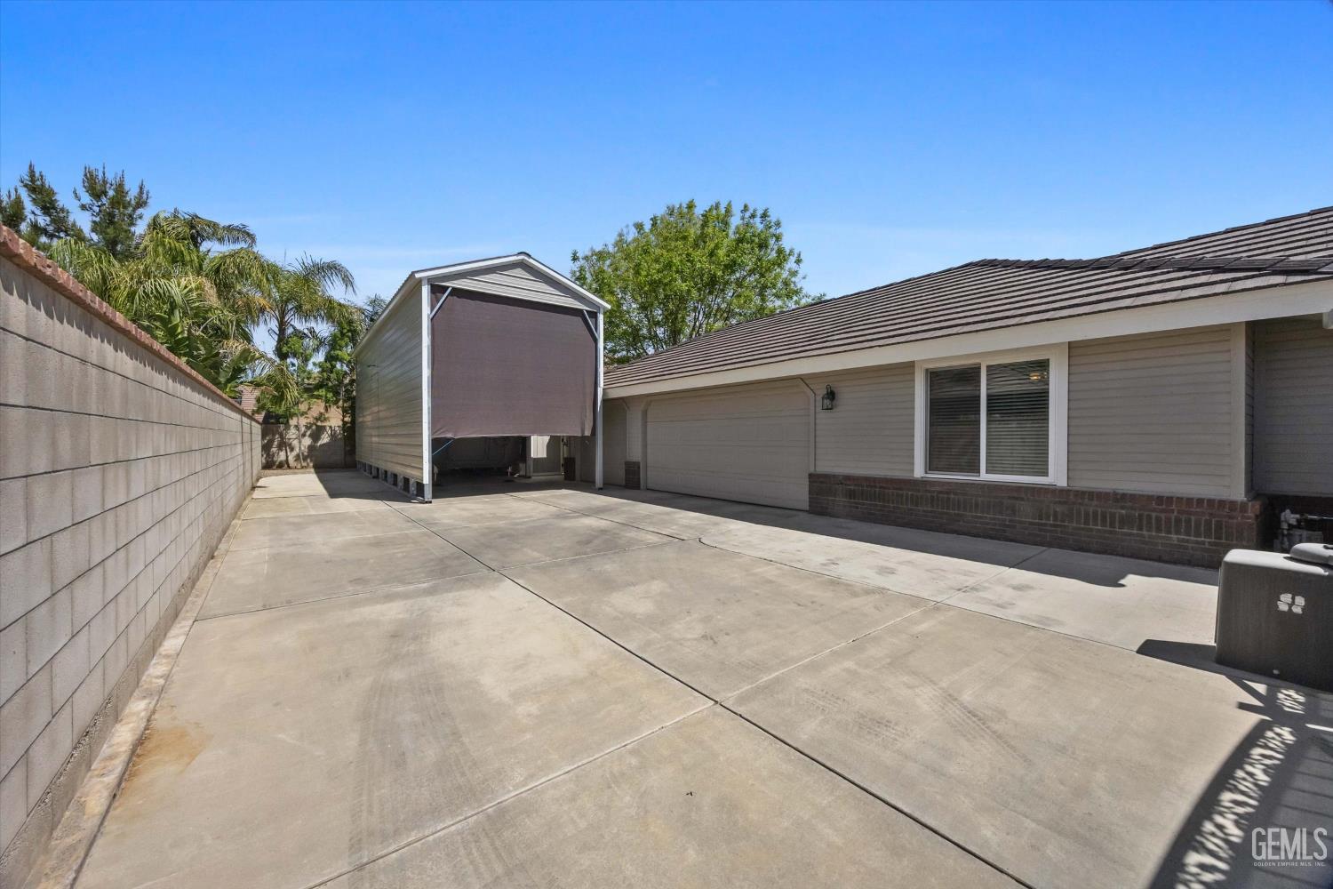 Undisclosed Address Bakersfield, CA 93314 - Photo 51 of 58 a house view with a outdoor space