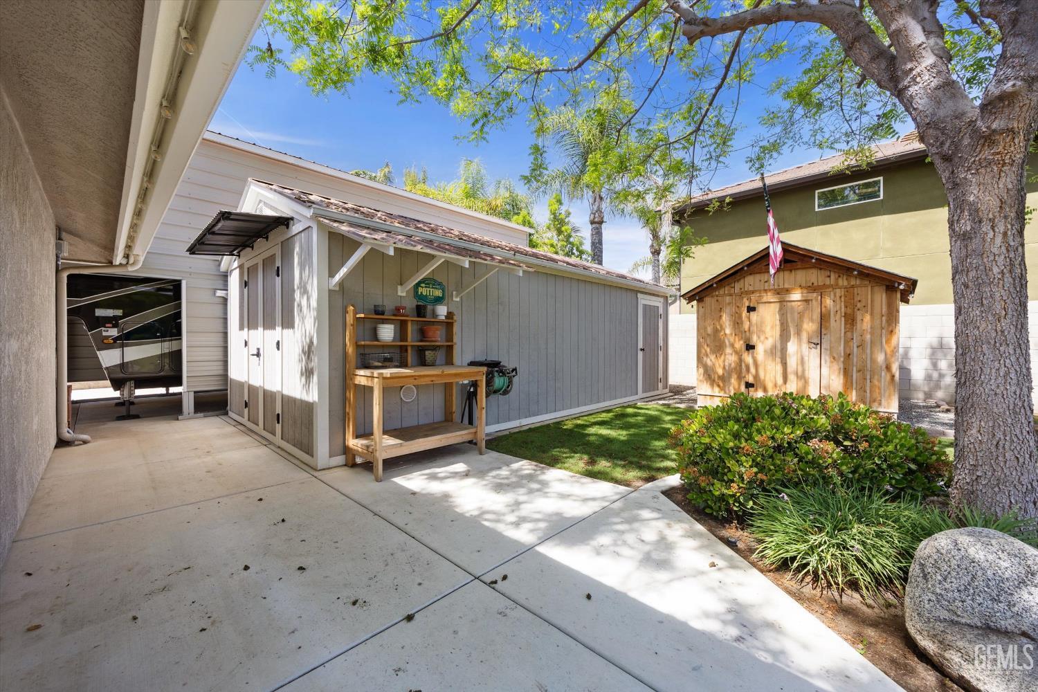 Undisclosed Address Bakersfield, CA 93314 - Photo 53 of 58 a yellow house with a outdoor space